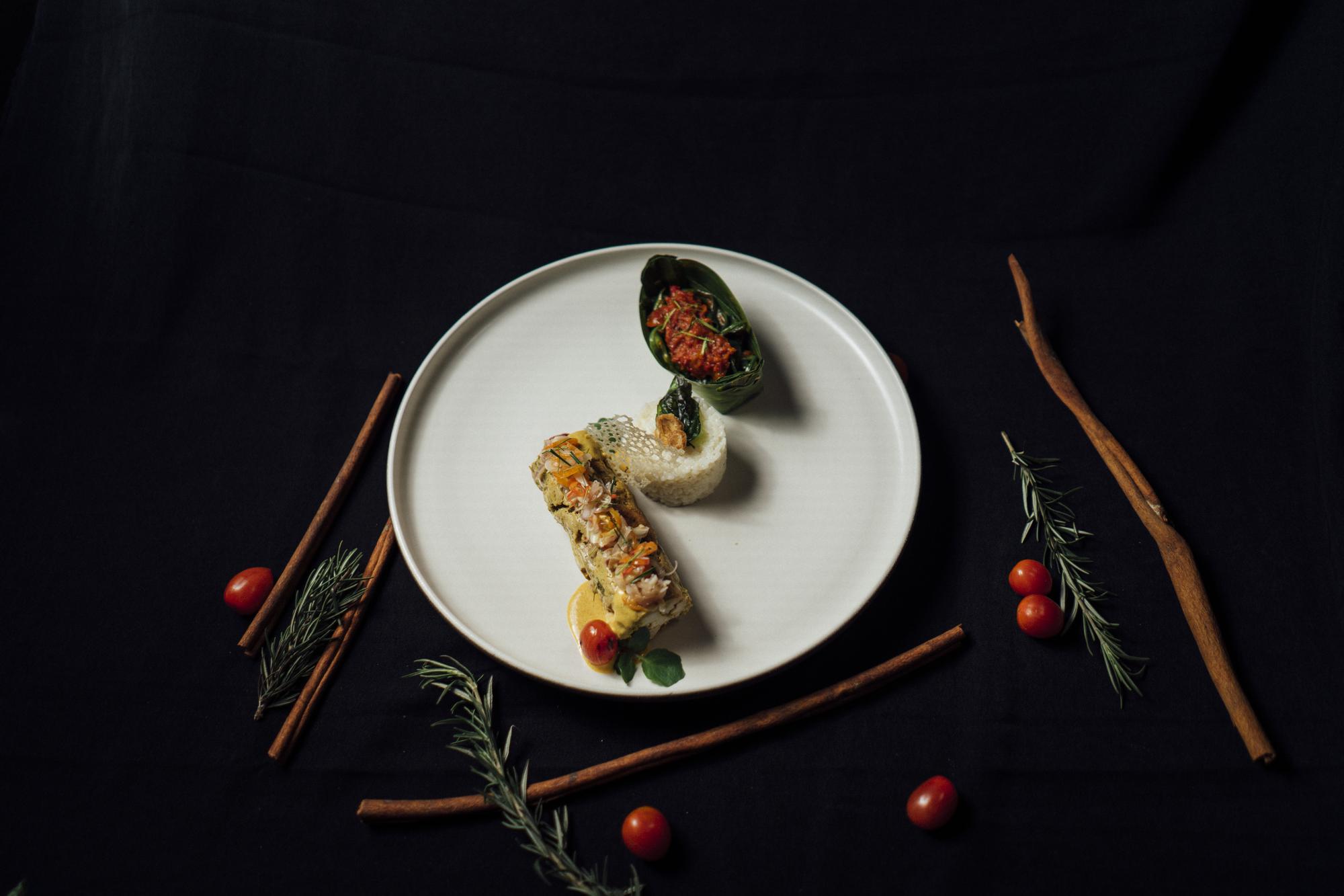Elegant plated course with dark background